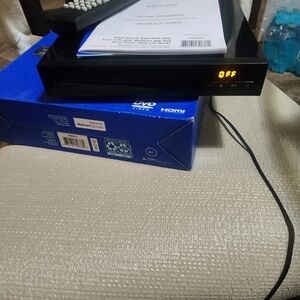 Brand New ONN Black DVD Player with Remote And Booklet